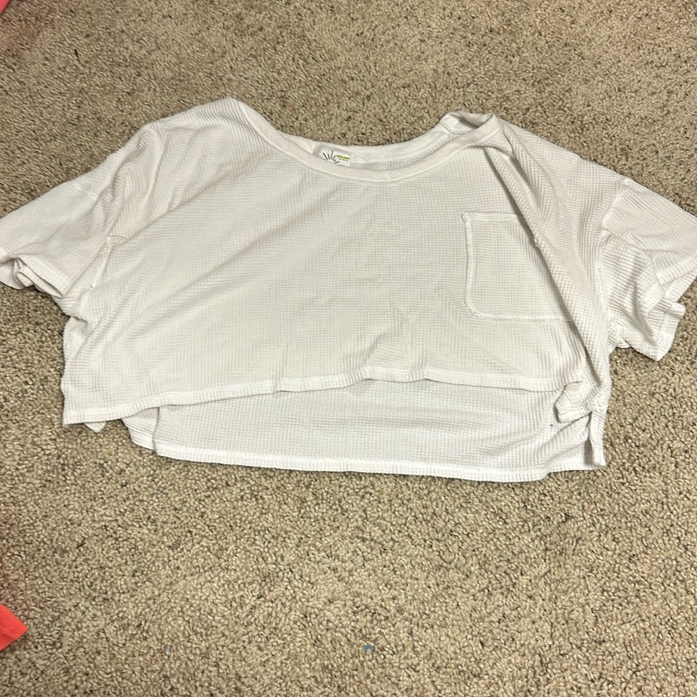 This Offline by Aerie crop top is a size XL/TG, and it is white